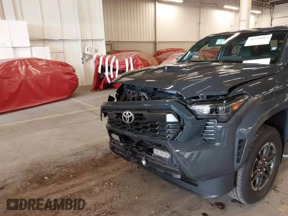 2024 Toyota Tacoma SR5 with VIN 3TMLB5JN9RM067351, listed as a IAAI auction lot 41529043 with 3,054 mi miles and . Bid and sale history available at DreamBid. Image 6.