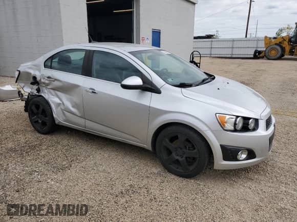 2013 Chevrolet Sonic LTZ с VIN 1G1JE5SH7D4152807, выставлен на аукционе Copart как лот 58600395 с пробегом 129 542 миль миль и Списание • Salvage title. История ставок и продаж доступна на DreamBid. Изображение 4.