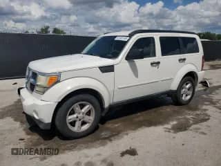 2007 Dodge Nitro SXT with VIN 1D8GU28K27W661610, listed as a Copart auction lot 81045195 with 153,517 mi miles and Salvage title. Bid and sale history available at DreamBid. Image 1.