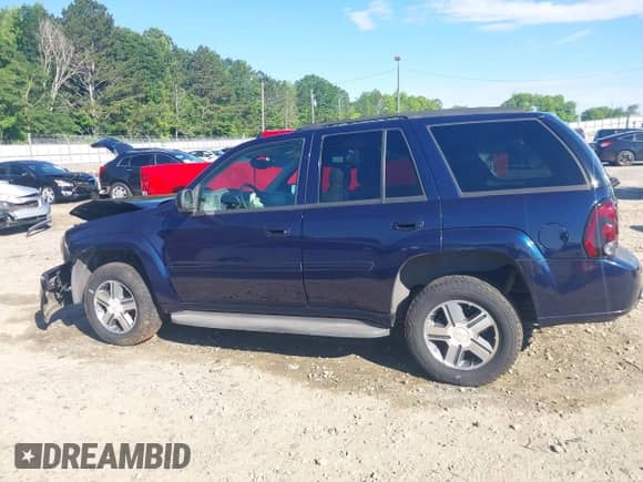 2007 Chevrolet TrailBlazer LT z VIN 1GNDT13S972265940, wystawiony jako IAAI lot #42311630 z przebiegiem 58 798 mil mil oraz . Historia ofert i sprzedaży dostępna na DreamBid. Obrazek 14.