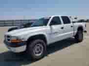 2000 Dodge Dakota Sport with VIN 1B7GG2AN8YS598547, listed as a Copart auction lot 54520985 with 244,605 mi miles and Salvage title. Bid and sale history available at DreamBid. Image 1.