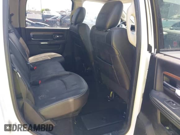 2014 Ram 1500 Laramie z VIN 1C6RR7VM1ES312946, wystawiony jako IAAI lot #42620415 z przebiegiem 163 405 mil mil oraz . Historia ofert i sprzedaży dostępna na DreamBid. Obrazek 8.