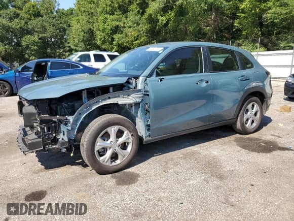 2025 Honda HR-V LX with VIN 3CZRZ1H31SM737588, listed as a Copart auction lot 69590765 with 9,465 mi miles and Salvage title. Bid and sale history available at DreamBid. Image 1.