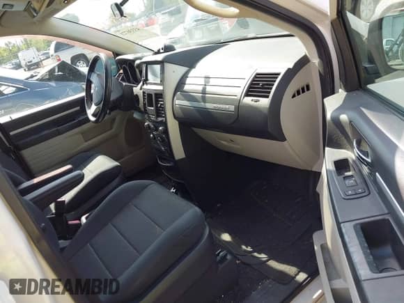 2009 Dodge Grand Caravan SXT with VIN 2D8HN54139R561219, listed as a IAAI auction lot 43330721 with 183,993 mi miles and . Bid and sale history available at DreamBid. Image 5.