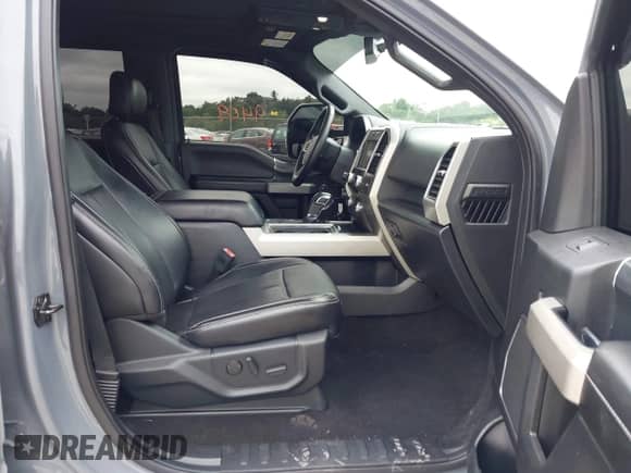 2019 Ford F-150 XLT with VIN 1FTEW1E42KFA25732, listed as a IAAI auction lot 43039409 with 64,482 mi miles and . Bid and sale history available at DreamBid. Image 5.