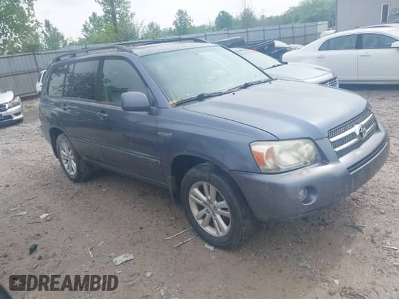 2007 Toyota Highlander with VIN JTEGW21AX70021363, listed as a IAAI auction lot 42217102 with 210,789 mi miles and . Bid and sale history available at DreamBid. Image 1.