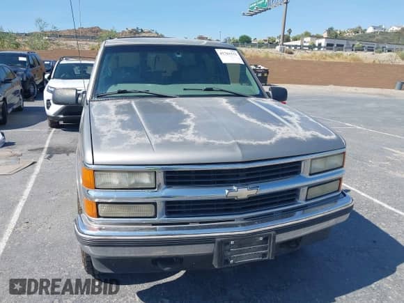 1999 Chevrolet Tahoe Z71 with VIN 1GNEK13R0XJ528438, listed as a IAAI auction lot 42761532 with 235,135 mi miles and . Bid and sale history available at DreamBid. Image 6.