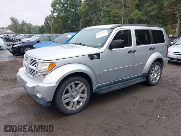 2011 Dodge Nitro Heat with VIN 1D4PU4GKXBW582709, listed as a IAAI auction lot 43149996 with 169,385 mi miles and . Bid and sale history available at DreamBid. Image 2.