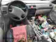 2000 Chevrolet Prizm с VIN 1Y1SK528XYZ418233, выставлен на аукционе Copart как лот 83036344 с пробегом Не указан миль и Списание • Salvage title. История ставок и продаж доступна на DreamBid. Изображение 8.