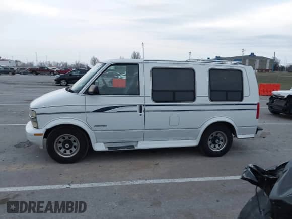 1995 Chevrolet Astro Cargo with VIN 1GBDM19W5SB172412, listed as a IAAI auction lot 41172353 with 119,531 mi miles and . Bid and sale history available at DreamBid. Image 14.