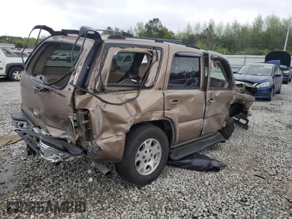 2004 Chevrolet Tahoe LS with VIN 1GNEC13ZX4R152843, listed as a Copart auction lot 51775035 with 294,488 mi miles and Salvage title. Bid and sale history available at DreamBid. Image 3.