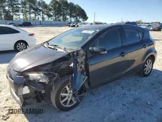 2012 Toyota Prius Two with VIN JTDKDTB30C1004912, listed as a Copart auction lot 82494235 with 197,949 mi miles and Salvage title. Bid and sale history available at DreamBid. Image 1.