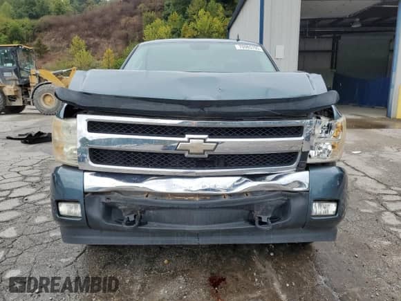 2007 Chevrolet Silverado 1500 1LT with VIN 1GCEK190X7Z577102, listed as a Copart auction lot 70985705 with 130,470 mi miles and Salvage title. Bid and sale history available at DreamBid. Image 5.