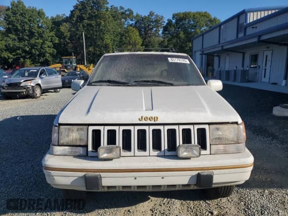 1993 Jeep Grand Cherokee Limited z VIN 1J4GZ78Y1PC697768, wystawiony jako Copart lot #85178745 z przebiegiem 152 032 mil mil oraz Szkoda całkowita • Salvage title. Historia ofert i sprzedaży dostępna na DreamBid. Obrazek 5.