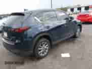 2023 Mazda CX-5 S Preferred z VIN JM3KFBCMXP0209359, wystawiony jako IAAI lot #42724622 z przebiegiem 14 682 mil mil oraz . Historia ofert i sprzedaży dostępna na DreamBid. Obrazek 4.