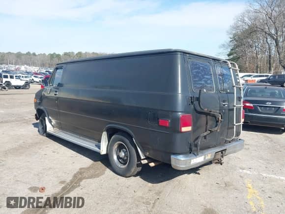 1985 Chevrolet Chevy Van z VIN 1GCEG25H6F7208590, wystawiony jako IAAI lot #41742731 z przebiegiem 34 184 mil mil oraz . Historia ofert i sprzedaży dostępna na DreamBid. Obrazek 3.