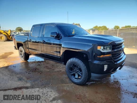 2018 Chevrolet Silverado 1500 LT z VIN 3GCUKREC9JG247985, wystawiony jako Copart lot #89700785 z przebiegiem 176 054 mil mil oraz Czysty tytuł • Clean title. Historia ofert i sprzedaży dostępna na DreamBid. Obrazek 4.