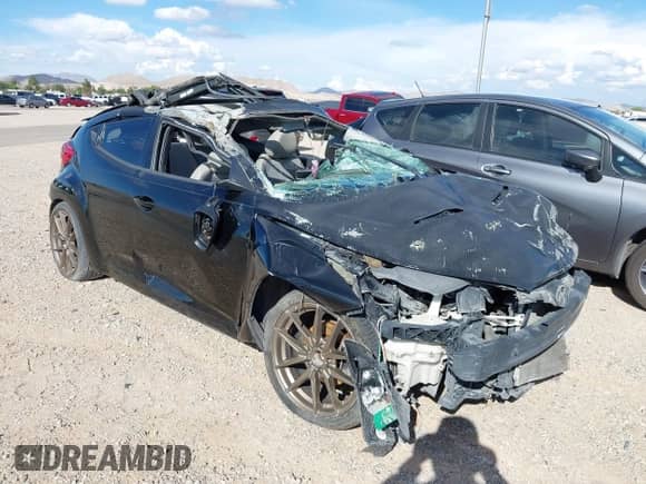 2013 Hyundai Veloster w/Gray Int z VIN KMHTC6AD8DU101094, wystawiony jako IAAI lot #42610303 z przebiegiem Nie podano mil oraz . Historia ofert i sprzedaży dostępna na DreamBid. Obrazek 1.