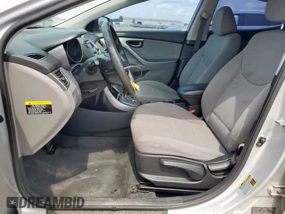 2013 Hyundai Elantra GLS z VIN KMHDH4AE2DU942363, wystawiony jako Copart lot #69069255 z przebiegiem 168 363 mil mil oraz Szkoda całkowita • Salvage title. Historia ofert i sprzedaży dostępna na DreamBid. Obrazek 7.