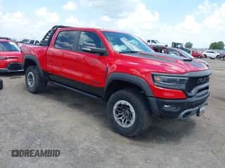 2021 Ram 1500 TRX with VIN 1C6SRFU95MN685249, listed as a IAAI auction lot 42745259 with 20,905 mi miles and . Bid and sale history available at DreamBid. Image 1.