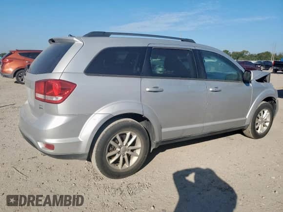 2014 Dodge Journey SXT with VIN 3C4PDCBG6ET107854, listed as a Copart auction lot 85343145 with 160,289 mi miles and Salvage title. Bid and sale history available at DreamBid. Image 3.