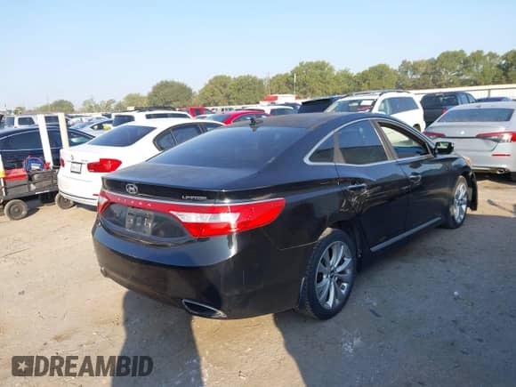 2014 Hyundai Azera Limited with VIN KMHFH4JG7EA396981, listed as a IAAI auction lot 43135345 with 94,613 mi miles and . Bid and sale history available at DreamBid. Image 4.