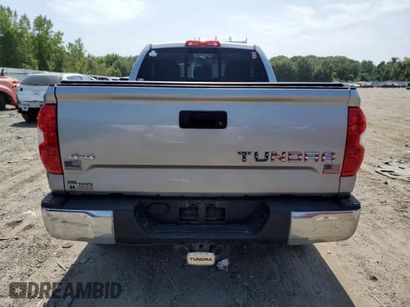 2019 Toyota Tundra SR с VIN 5TFUM5F10KX083538, выставлен на аукционе Copart как лот 68304055 с пробегом 131 034 миль миль и Списание • Salvage title. История ставок и продаж доступна на DreamBid. Изображение 6.