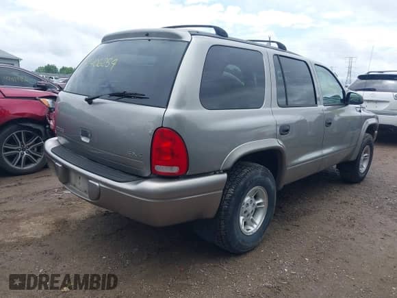 1999 Dodge Durango with VIN 1B4HS28Y2XF684492, listed as a IAAI auction lot 42406259 with 241,447 mi miles and . Bid and sale history available at DreamBid. Image 4.