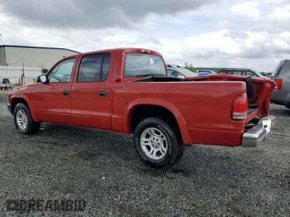 2004 Dodge Dakota Sport с VIN 1D7HL38KX4S685089, выставлен на аукционе Copart как лот 54729285 с пробегом 243 921 миль миль и На запчасти • Non repairable. История ставок и продаж доступна на DreamBid. Изображение 2.