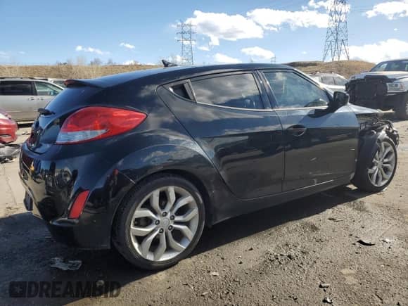 2012 Hyundai Veloster w/Red Int with VIN KMHTC6AD6CU048698, listed as a Copart auction lot 44009865 with 102,019 mi miles and Salvage title. Bid and sale history available at DreamBid. Image 3.