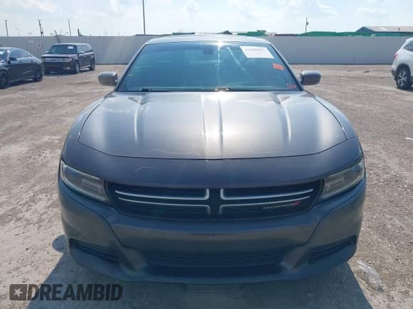 2015 Dodge Charger SE with VIN 2C3CDXBGXFH735601, listed as a IAAI auction lot 43106037 with 116,702 mi miles and . Bid and sale history available at DreamBid. Image 12.