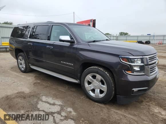 2015 Chevrolet Suburban LTZ z VIN 1GNSKKKC7FR254340, wystawiony jako Copart lot #82104195 z przebiegiem 152 947 mil mil oraz Szkoda całkowita • Salvage title. Historia ofert i sprzedaży dostępna na DreamBid. Obrazek 4.