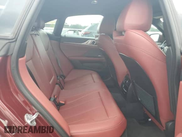 2023 BMW i4 eDrive40 with VIN WBY73AW09PFP11995, listed as a Copart auction lot 66709265 with 31,084 mi miles and Salvage title. Bid and sale history available at DreamBid. Image 10.