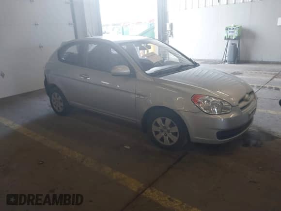 2010 Hyundai Accent GS z VIN KMHCM3AC1AU169431, wystawiony jako IAAI lot #41549939 z przebiegiem 80 798 mil mil oraz . Historia ofert i sprzedaży dostępna na DreamBid. Obrazek 1.