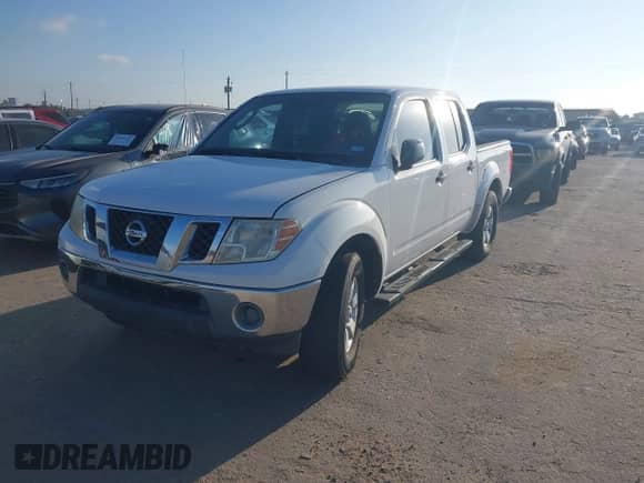 2010 Nissan Frontier SE with VIN 1N6AD0ER5AC402545, listed as a IAAI auction lot 43305489 with 185,332 mi miles and . Bid and sale history available at DreamBid. Image 2.