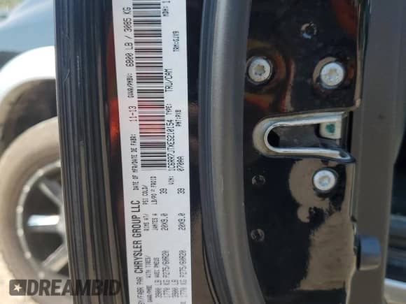 2014 Ram 1500 Laramie with VIN 1C6RR7JTXES210154, listed as a Copart auction lot 68173015 with 162,894 mi miles and Clean title. Bid and sale history available at DreamBid. Image 12.