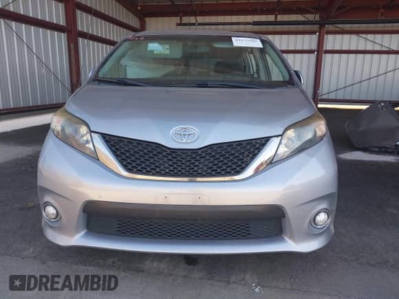 2014 Toyota Sienna SE with VIN 5TDXK3DC3ES495233, listed as a IAAI auction lot 43173582 with Not provided miles and . Bid and sale history available at DreamBid. Image 12.