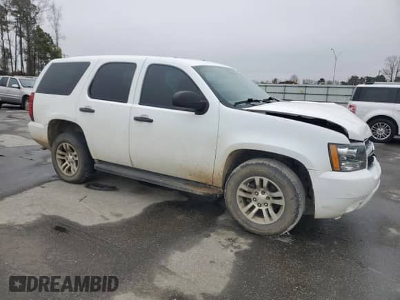 2014 Chevrolet Tahoe Commercial с VIN 1GNSK2E03ER181239, выставлен на аукционе Copart как лот 44173795 с пробегом 261 142 миль миль и Списание • Salvage title. История ставок и продаж доступна на DreamBid. Изображение 4.