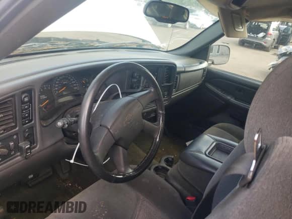 2004 Chevrolet Silverado 1500 LS z VIN 1GCEK14T54E131086, wystawiony jako Copart lot #84249445 z przebiegiem Nie podano mil oraz Nie do naprawy • Non repairable. Historia ofert i sprzedaży dostępna na DreamBid. Obrazek 8.