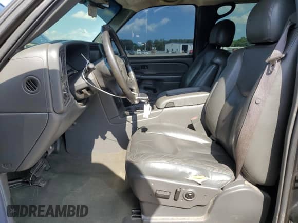 2004 GMC Sierra 1500 SLT with VIN 2GTEK13T941332525, listed as a Copart auction lot 64721925 with 242,636 mi miles and Salvage title. Bid and sale history available at DreamBid. Image 7.