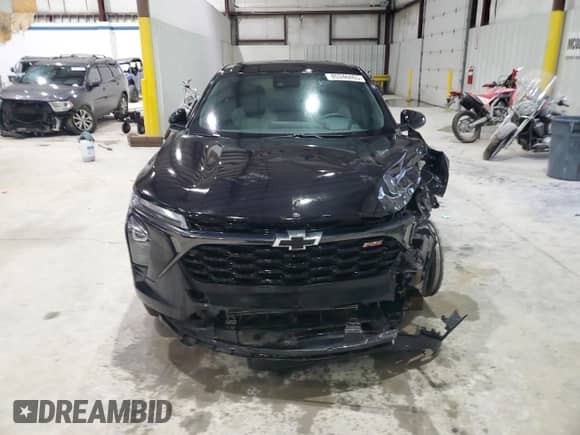 2024 Chevrolet Trax 1RS с VIN KL77LGE23RC018932, выставлен на аукционе Copart как лот 85346065 с пробегом Не указан миль и Списание • Salvage title. История ставок и продаж доступна на DreamBid. Изображение 5.