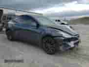 2022 Tesla Model Y Performance with VIN 7SAYGDEF4NF461619, listed as a Copart auction lot 89664875 with 83,916 mi miles and Salvage title. Bid and sale history available at DreamBid. Image 4.