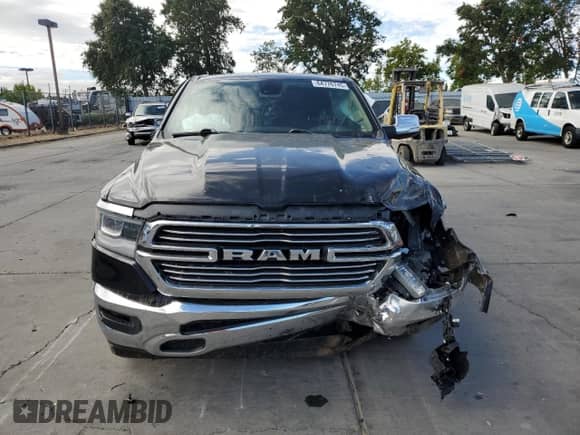2019 Ram 1500 Laramie с VIN 1C6SRFJT9KN505798, выставлен на аукционе Copart как лот 64776745 с пробегом Не указан миль и Списание • Salvage title. История ставок и продаж доступна на DreamBid. Изображение 5.