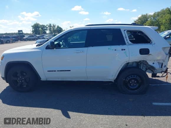 2019 Jeep Grand Cherokee Altitude with VIN 1C4RJFAG6KC843642, listed as a IAAI auction lot 43223034 with 71,505 mi miles and . Bid and sale history available at DreamBid. Image 14.