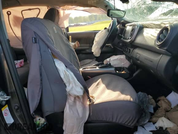 2020 Toyota Tacoma SR5 z VIN 3TMCZ5AN7LM291155, wystawiony jako Copart lot #67111255 z przebiegiem 106 969 mil mil oraz Szkoda całkowita • Salvage title. Historia ofert i sprzedaży dostępna na DreamBid. Obrazek 7.