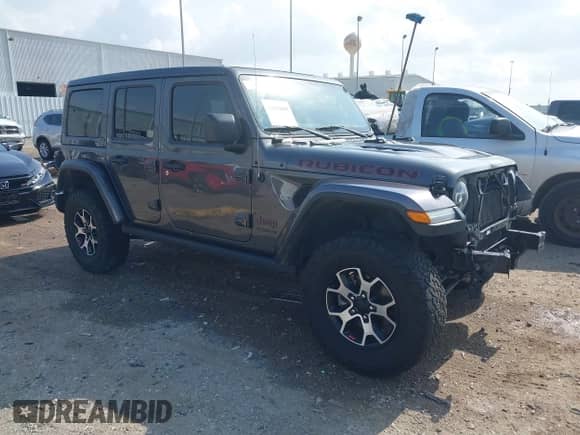 2021 Jeep Wrangler Unlimited Rubicon with VIN 1C4HJXFG0MW556857, listed as a IAAI auction lot 42103688 with 80,570 mi miles and . Bid and sale history available at DreamBid. Image 1.
