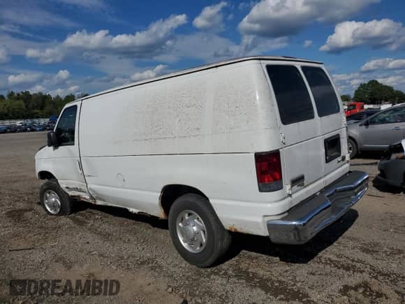 2013 Ford Econoline Cargo Commercial с VIN 1FTNE2ELXDDA17666, выставлен на аукционе Copart как лот 84232745 с пробегом 261 654 миль миль и Списание • Salvage title. История ставок и продаж доступна на DreamBid. Изображение 2.