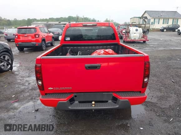 2012 Chevrolet Colorado Work Truck z VIN 1GCCSBF99C8127098, wystawiony jako IAAI lot #43303759 z przebiegiem 79 862 mil mil oraz . Historia ofert i sprzedaży dostępna na DreamBid. Obrazek 17.