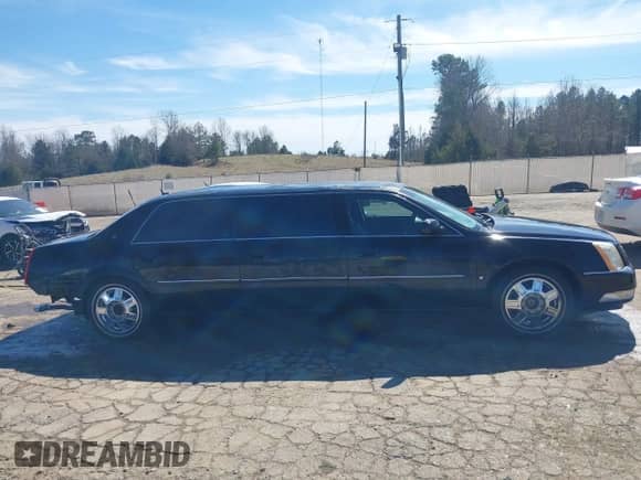 2006 Cadillac DTS Professional with VIN 1GEEH96Y56U550027, listed as a IAAI auction lot 41663248 with 58,471 mi miles and . Bid and sale history available at DreamBid. Image 14.
