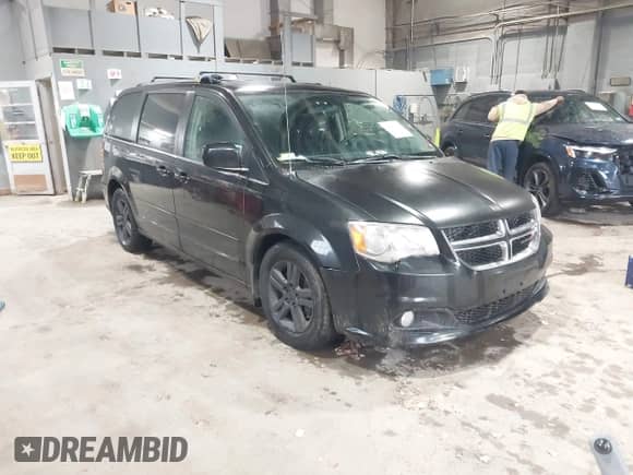 2012 Dodge Grand Caravan Crew with VIN 2C4RDGDG3CR359882, listed as a IAAI auction lot 43499308 with 157,986 mi miles and . Bid and sale history available at DreamBid. Image 1.